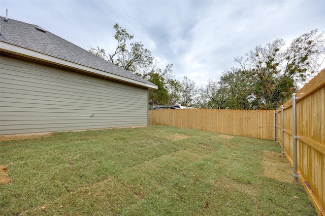 view of yard featuring a fenced backyard