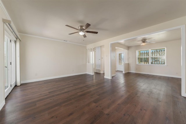 unfurnished bedroom with dark wood-style floors, visible vents, ornamental molding, ceiling fan, and baseboards