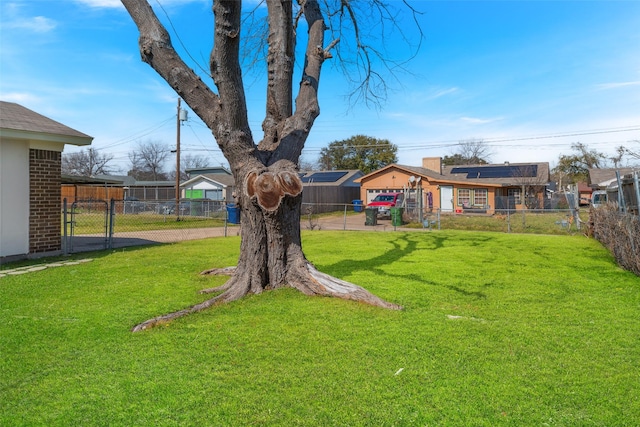 view of yard with a gate and a fenced backyard