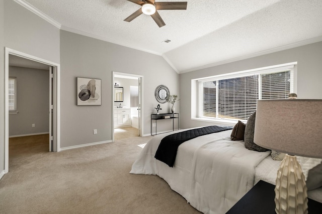 carpeted bedroom with lofted ceiling, ornamental molding, and visible vents