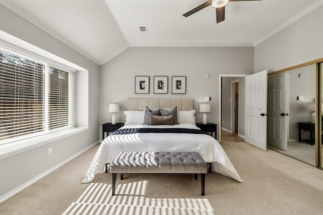 bedroom featuring ornamental molding, lofted ceiling, light carpet, and visible vents