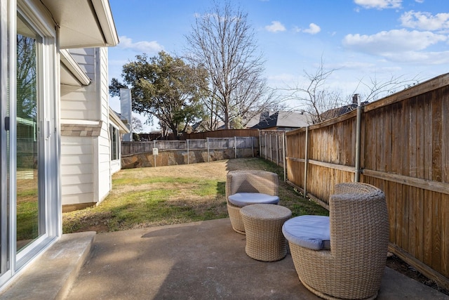 view of patio with a fenced backyard