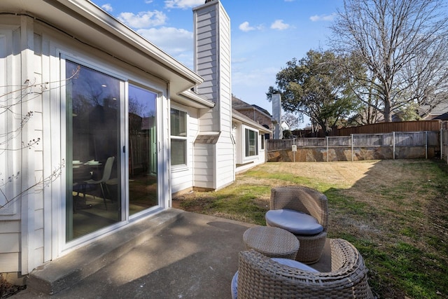 view of patio / terrace with fence