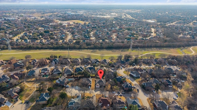 birds eye view of property with a residential view