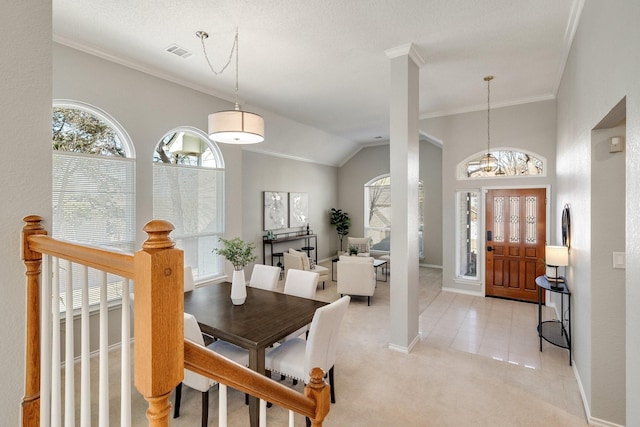 dining area with light tile patterned floors, light carpet, visible vents, baseboards, and crown molding