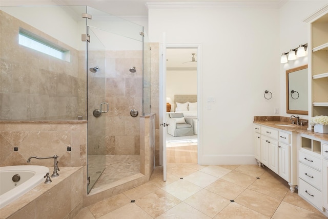 bathroom with a bath, a shower stall, crown molding, and vanity