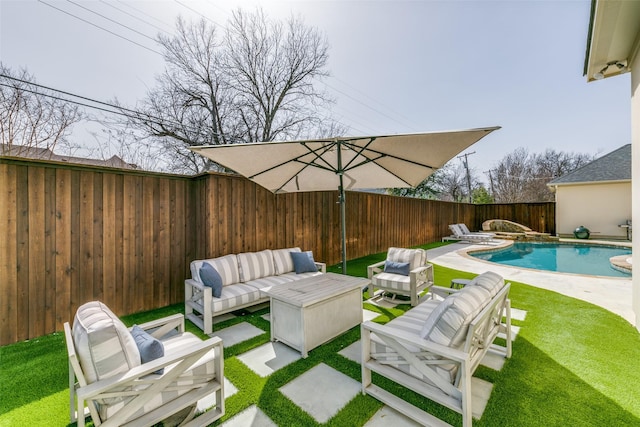 view of patio / terrace featuring an outdoor hangout area, a fenced backyard, and a fenced in pool