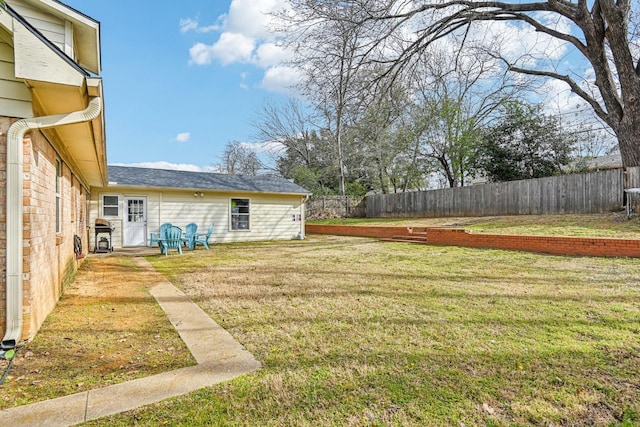 view of yard featuring fence