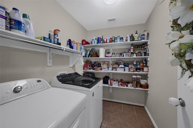 laundry area featuring laundry area, visible vents, baseboards, independent washer and dryer, and tile patterned floors