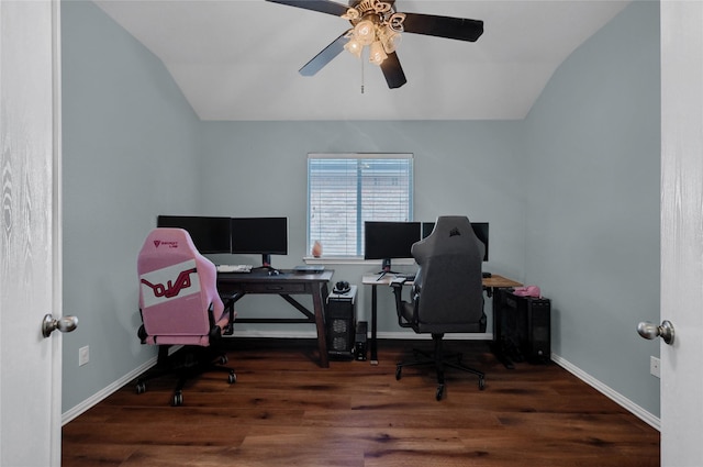 office area featuring ceiling fan, vaulted ceiling, baseboards, and wood finished floors