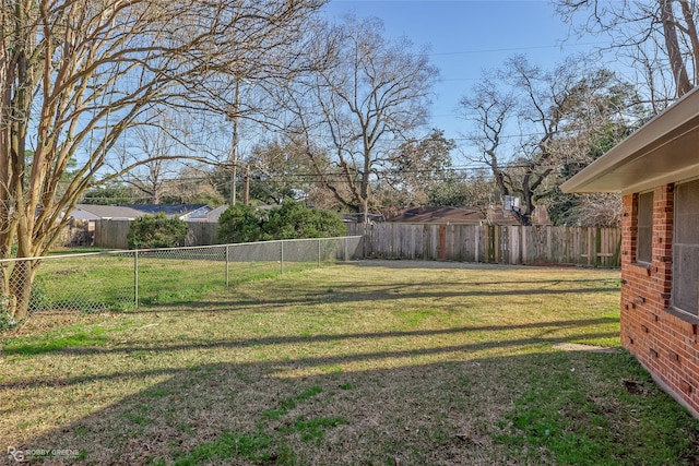 view of yard featuring a fenced backyard