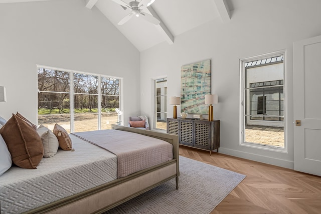 bedroom featuring ceiling fan, high vaulted ceiling, beam ceiling, and baseboards