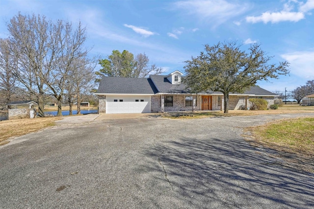 view of front of house with driveway and an attached garage