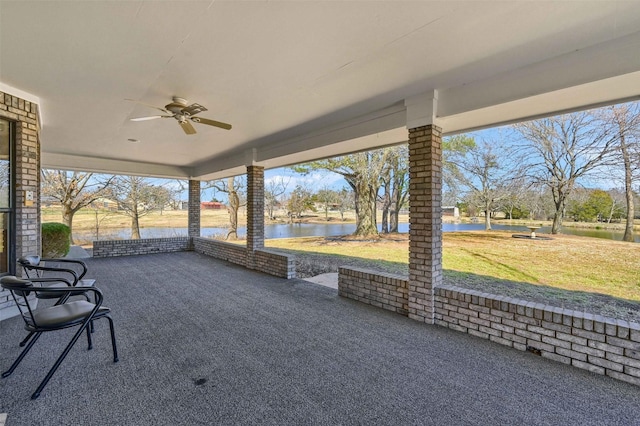 268 Roland Rd, Whitesboro, TX 76273 - view of patio featuring a water view and a ceiling fan
