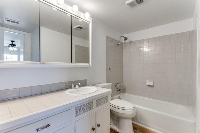 full bath featuring toilet, vanity, shower / tub combination, and visible vents