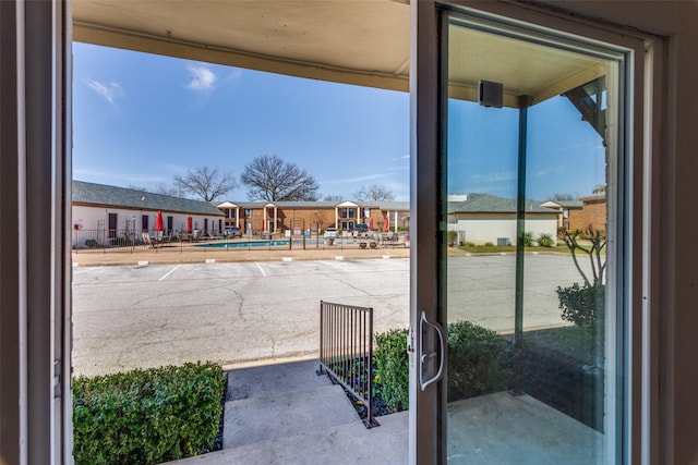 exterior space with a residential view and plenty of natural light