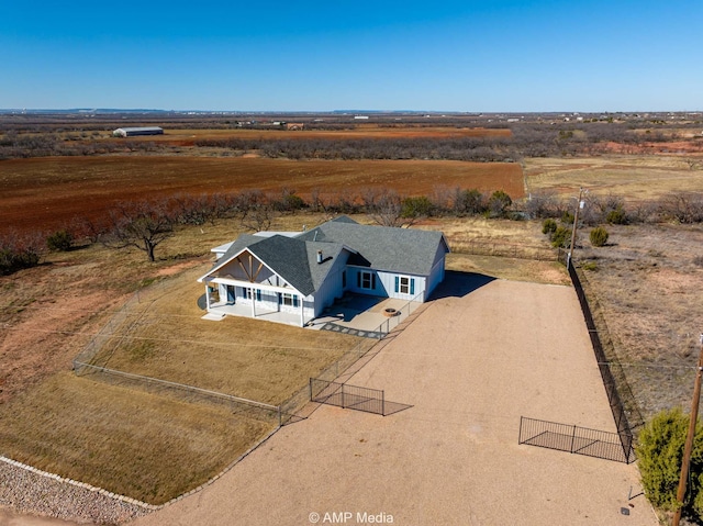 birds eye view of property featuring a rural view