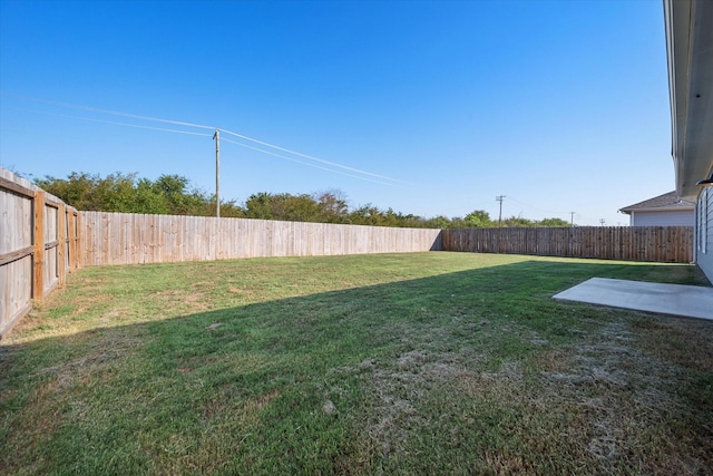 view of yard featuring a fenced backyard