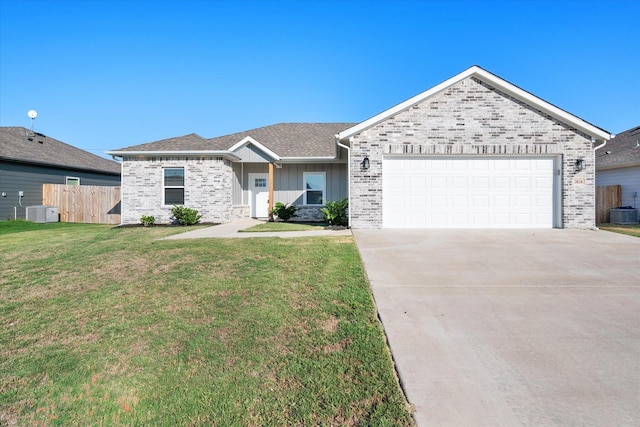 ranch-style home with driveway, fence, and brick siding