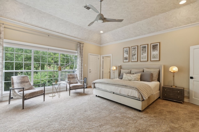 bedroom with visible vents, vaulted ceiling, a textured ceiling, crown molding, and carpet floors