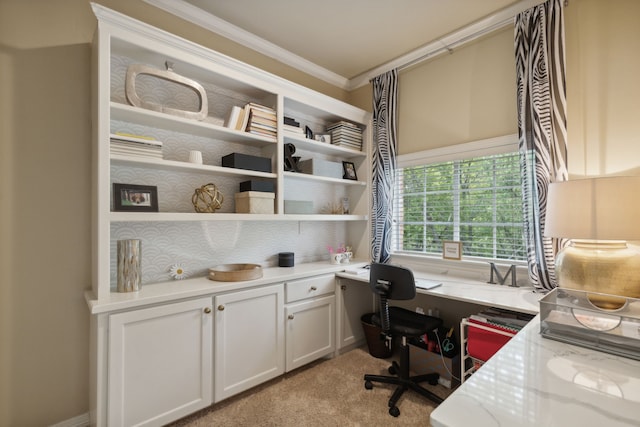 office area featuring light carpet and crown molding