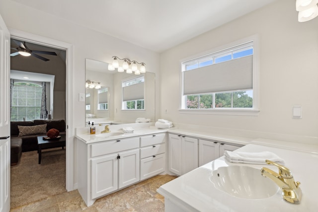 ensuite bathroom featuring ensuite bathroom and vanity