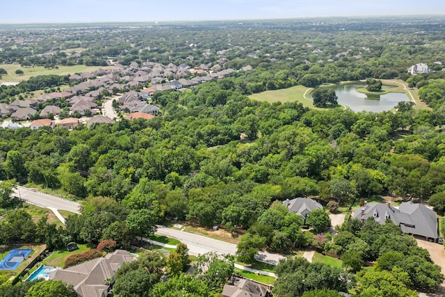 birds eye view of property with a water view and a residential view