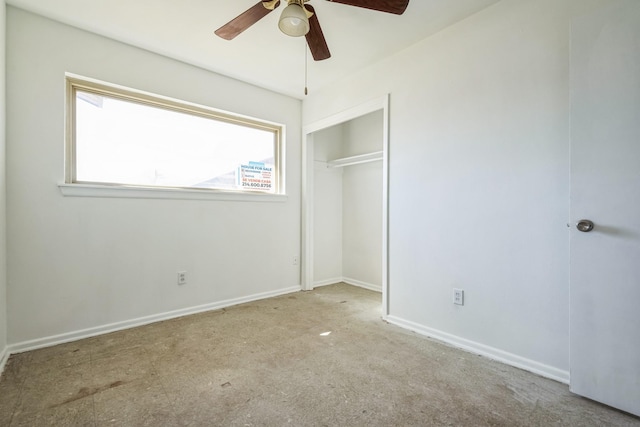 unfurnished bedroom featuring a ceiling fan, carpet, baseboards, and a closet