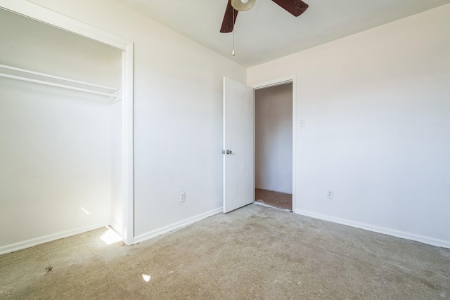 unfurnished bedroom with a ceiling fan and baseboards