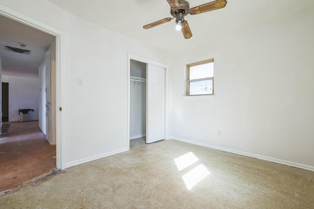 unfurnished bedroom with a ceiling fan, baseboards, visible vents, and a closet