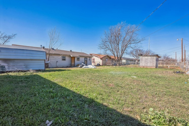 view of yard with fence