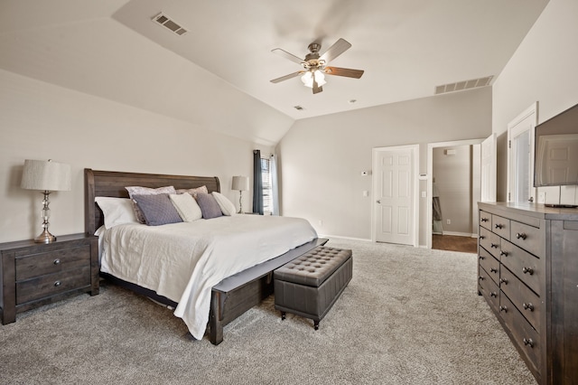 carpeted bedroom with a ceiling fan, lofted ceiling, visible vents, and baseboards