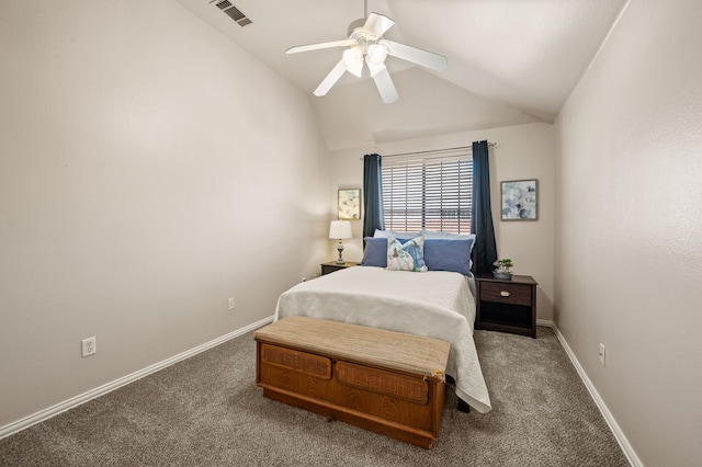 bedroom featuring lofted ceiling, visible vents, and carpet flooring