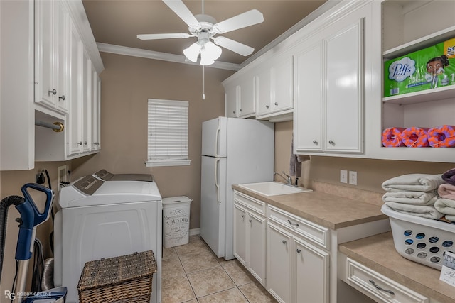 612 Kari Crk, Bossier City, LA 71111 - interior space with crown molding, a sink, separate washer and dryer, light countertops, and freestanding refrigerator