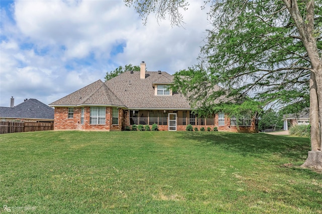 612 Kari Crk, Bossier City, LA 71111 - back of house featuring a chimney, fence, a yard, roof with shingles, and brick siding
