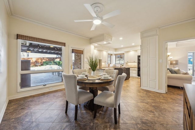 dining room with ceiling fan, ornamental molding, baseboards, and recessed lighting