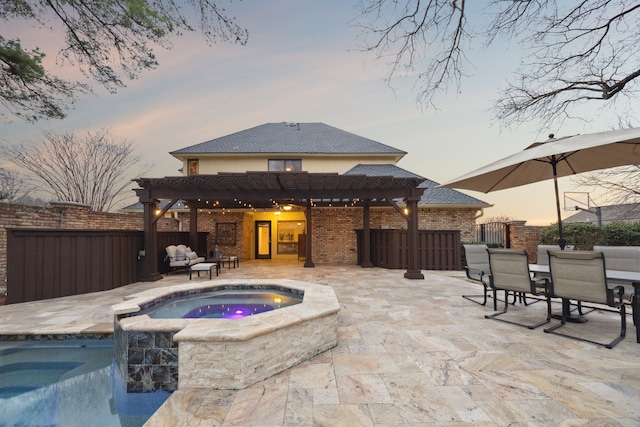 pool at dusk with a patio, an in ground hot tub, fence, a fenced in pool, and a pergola