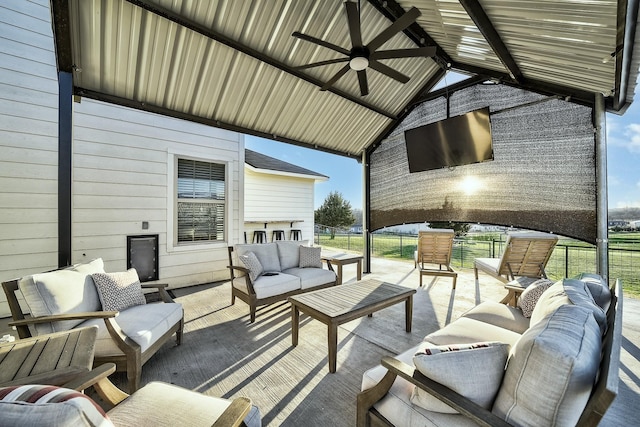 view of patio / terrace with ceiling fan and an outdoor hangout area