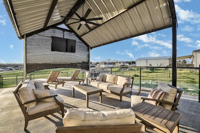 view of patio featuring ceiling fan and an outdoor hangout area