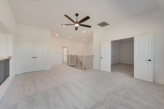 16470 Pelican Hl, Frisco, TX 75033 - unfurnished living room featuring a ceiling fan, light colored carpet, and recessed lighting
