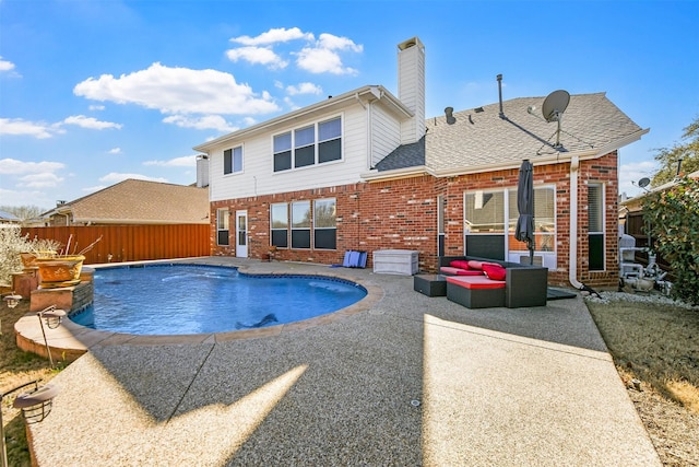 view of swimming pool with an outdoor hangout area, a patio, fence, and a fenced in pool