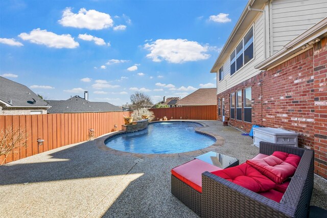 view of swimming pool featuring a fenced in pool, a fenced backyard, and a patio