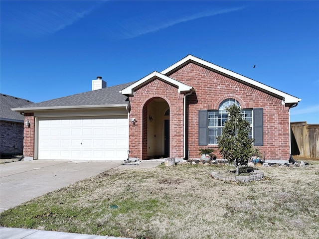 ranch-style house featuring driveway, roof with shingles, a chimney, and brick siding