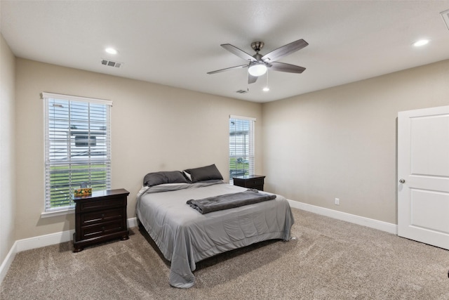 bedroom with visible vents, baseboards, a ceiling fan, carpet floors, and recessed lighting