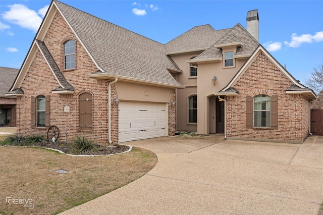 view of front of home featuring driveway, a shingled roof, a chimney, and brick siding