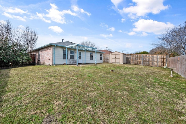 back of property with brick siding, a storage unit, a lawn, a fenced backyard, and an outdoor structure