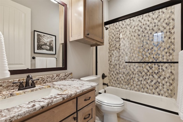 full bathroom with shower / bathing tub combination, vanity, and toilet