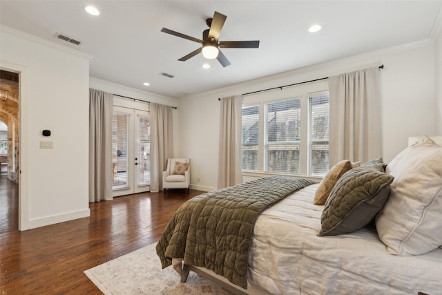 bedroom with access to exterior, visible vents, dark wood finished floors, and crown molding