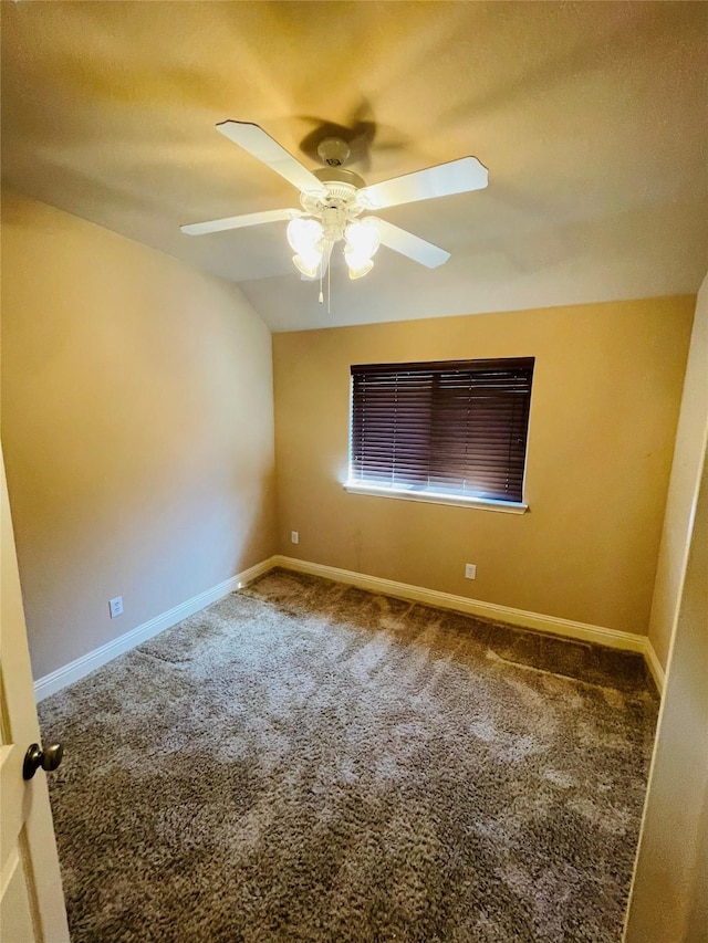 unfurnished room featuring carpet floors, baseboards, and a ceiling fan