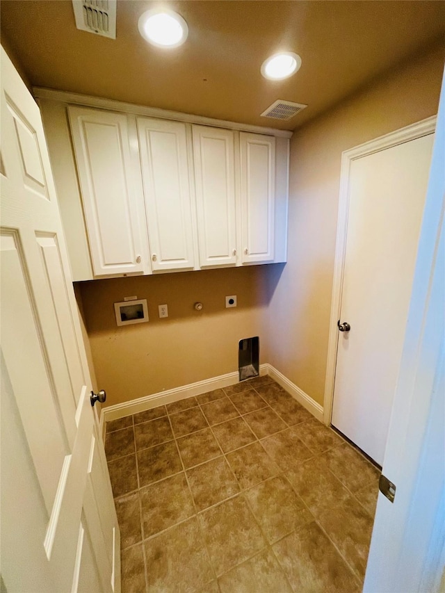 washroom featuring cabinet space, visible vents, washer hookup, and electric dryer hookup